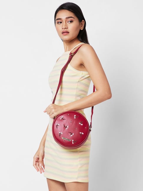 Caprese maroon sling bag best sale