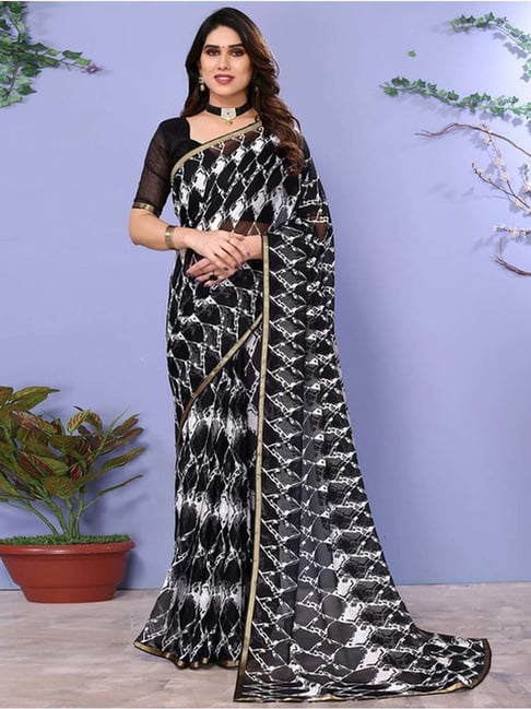 BLACK AND WHITE BLOCK STRIPED PRINTED CLASSIC SAREE SET PAIRED WITH A BLACK  SEQUINNED BLOUSE AND SEQUINNED BORDER. - Seasons India