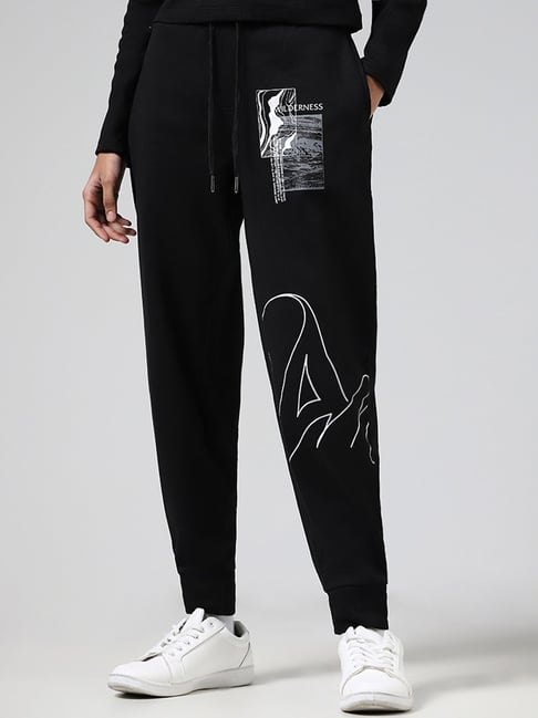 Buy Studiofit Women Studiofit by Westside Solid Black Typographic Printed  Joggers at Redfynd