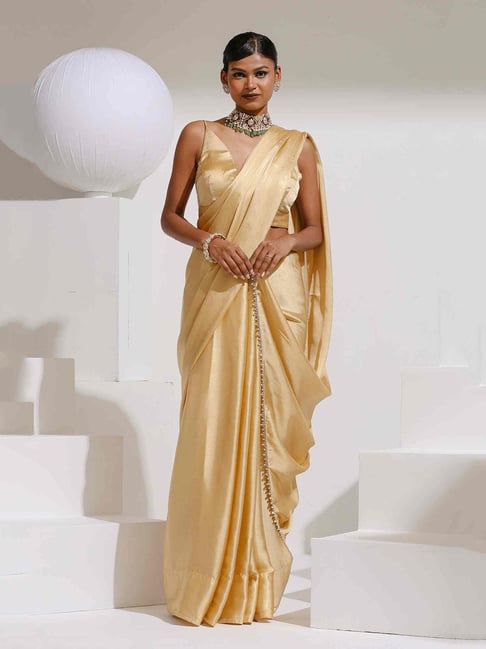 Bay Chic - Shop this saree: http://baychic.com/live-sale/a-december-wedding/ cream-blue-georgette-on-net-saree BC Price: INR: 18100 | BDT: 25137 | LKR:  38852 | PKR: 30631 | USD: 302.36 | MUR: 9899 | SAR: 1171.13 | OMR: 120.40