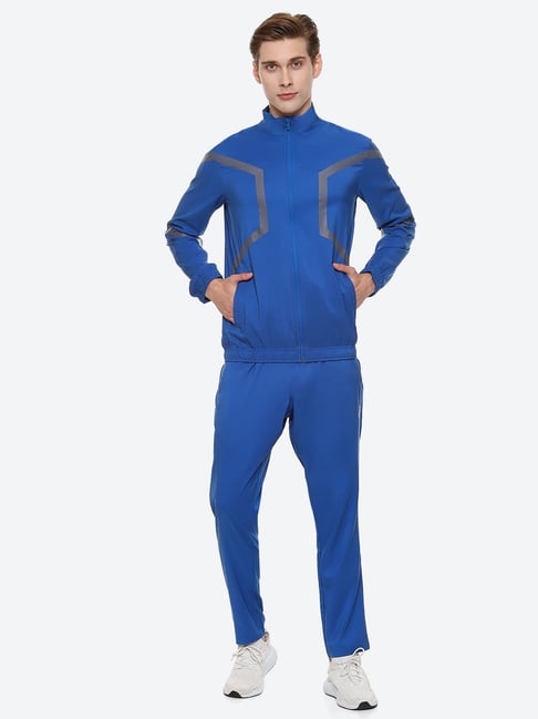 Asics on sale tracksuit online