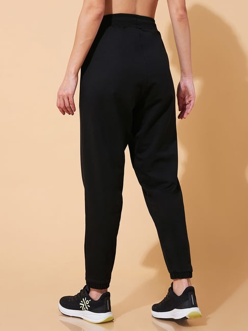 Ajile Women Solid Slim Fit Black Track Pants - Selling Fast at