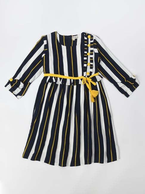 slim fit dress slacks ALINA PLEATED KNIT FIT AND FLARE MINI DRESS IN BLACK AND WHITE  AKIRA