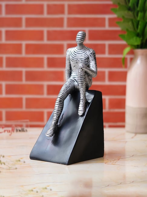 eCraftIndia Multicolor Polyresin  Man Statue Sitting on Triangle Black Base Human Showpiece-picture-26