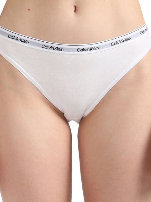 Buy Calvin Klein Underwear White Solid Bikini Bottoms for Women
