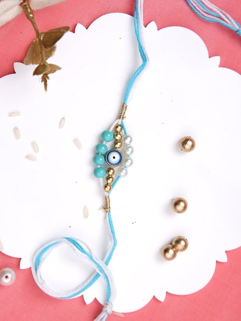 Aapno Rajasthan Blue Evil Eye Pearl Rakhi-picture-14