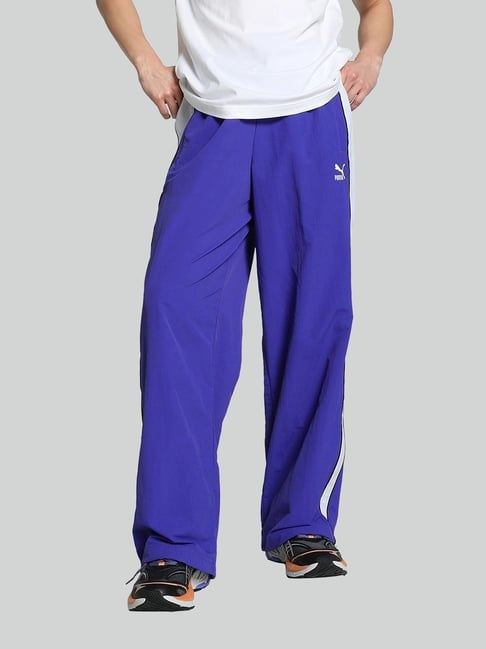 PUMA track pants blue × white Graphic Men's Slim Fit Track Pants | PUMA