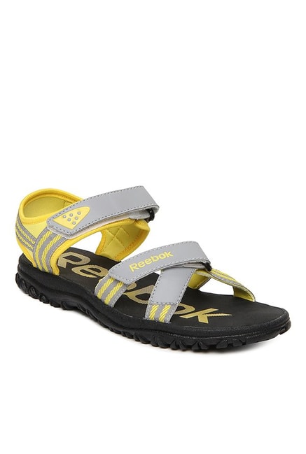 reebok yellow floater sandals