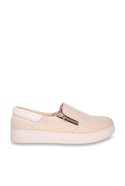 cream plimsolls