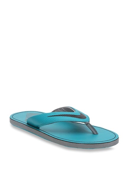 nike turquoise flip flops