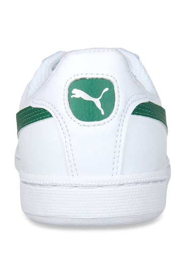 white and green puma shoes