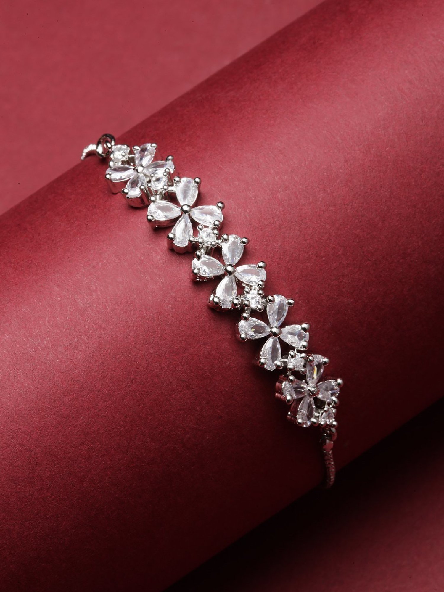 Buy Zeneme Rhodium Silver Toned Crystal AD Floral Link Bracelet