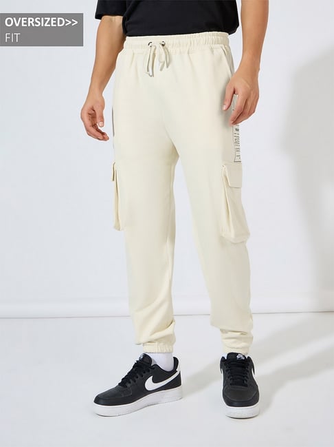 Styli Off White Cotton Relaxed Fit Graphic Cargo Joggers