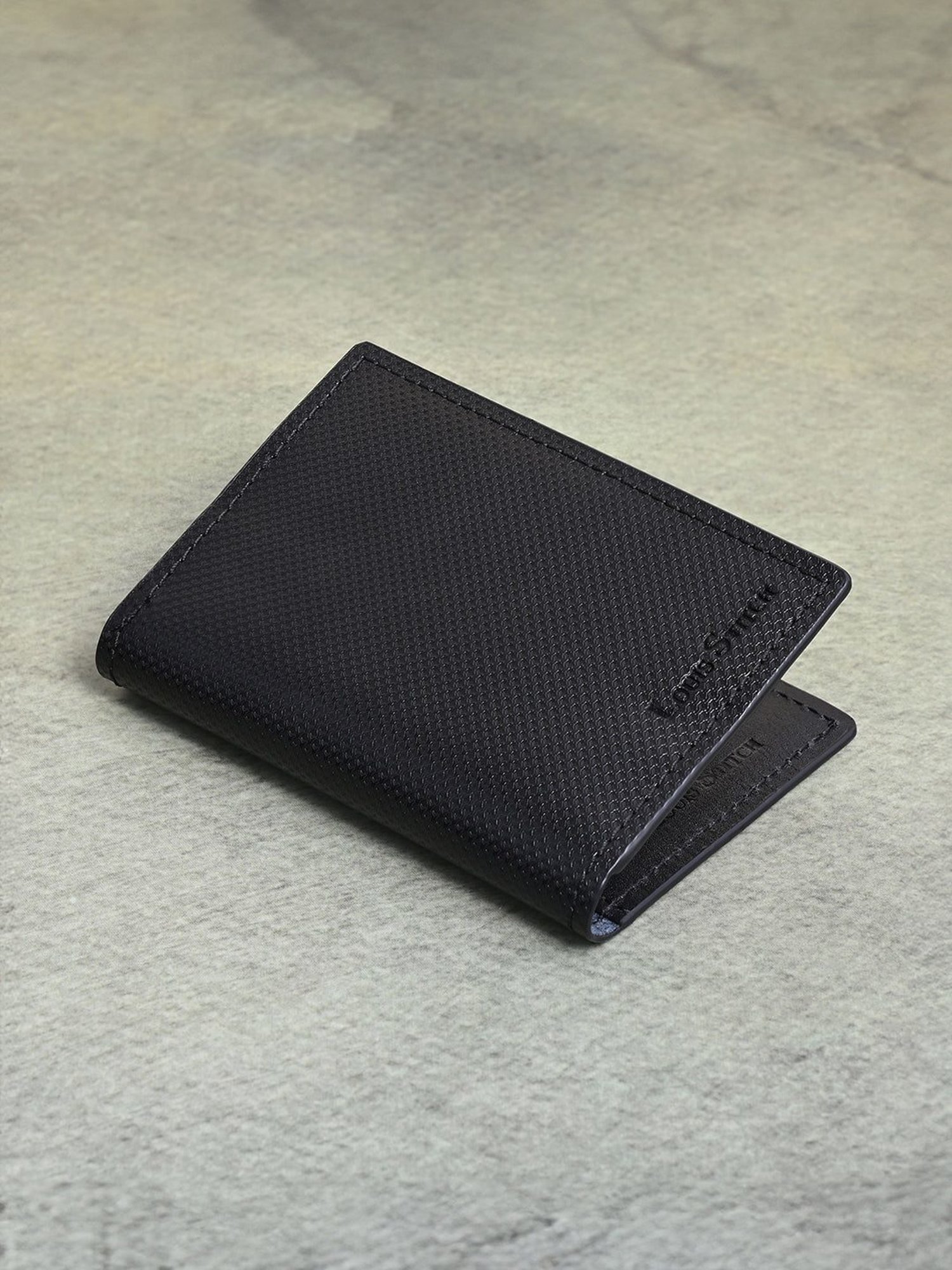 Louis Stitch Jet Black Textured Leather Medium Bi-Fold Wallet