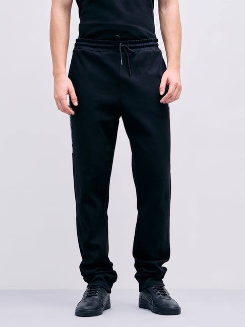 Iconic Black Regular fit Solid Joggers-picture-42