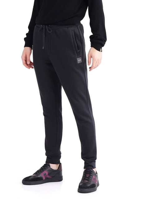Buy Rare Rabbit Black Regular Fit Solid Trackpants for Mens Online