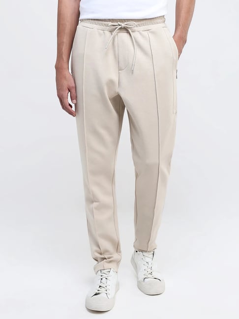Rare Rabbit Beige Regular Fit Solid Trackpants-image-4