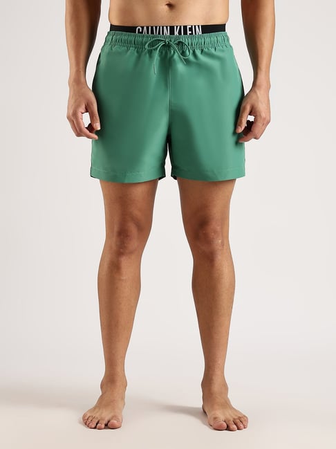 CALVIN KLEIN Green Solid Green Swimwear Shorts