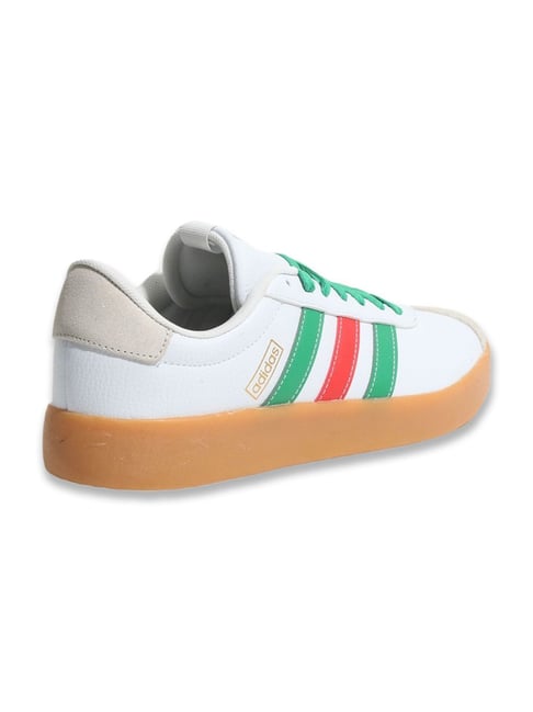 white adidas shoes with colorful bottoms