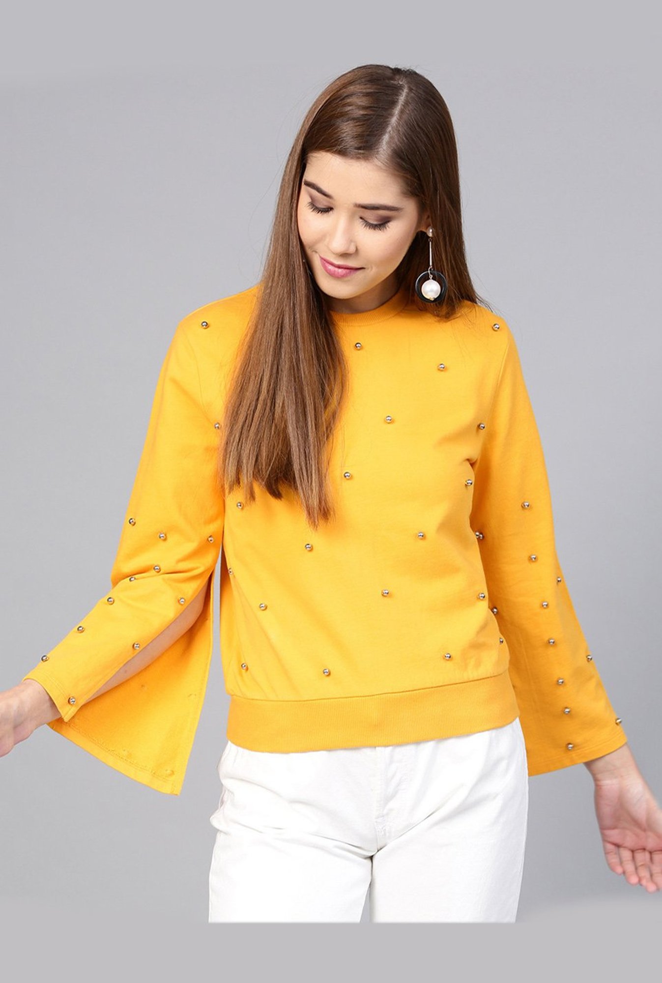 yellow embellished top