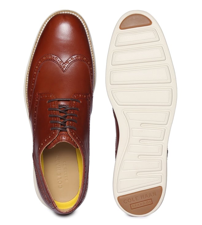 cole haan winston tan wingtip derbys