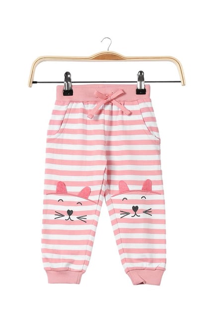 pink joggers with white stripe