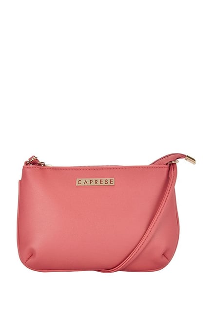 Caprese pink solid sling bag sale