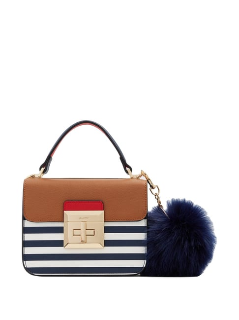 navy and tan handbag