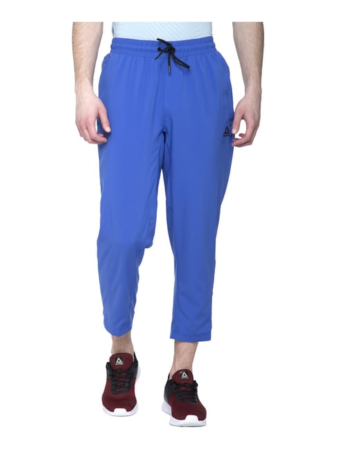 REEBOK Solid Men Blue Track Pants  Buy REEBOK Solid Men Blue Track Pants  Online at Best Prices in India  Shopsyin
