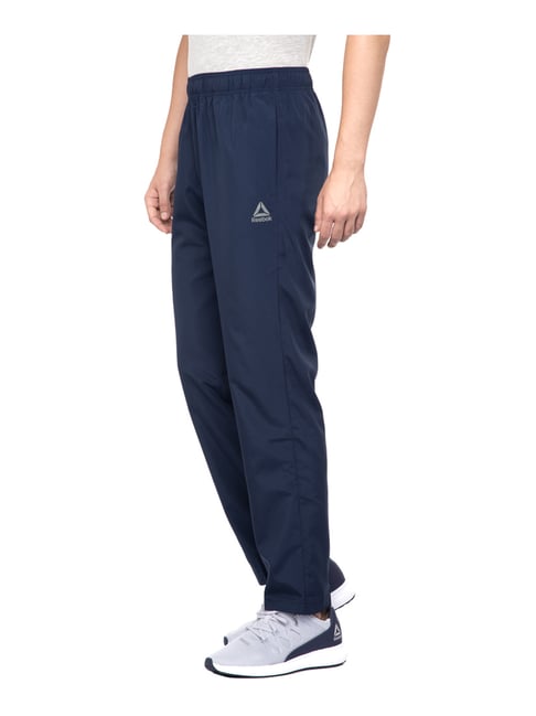 reebok men's workout ready stacked logo trackster pant