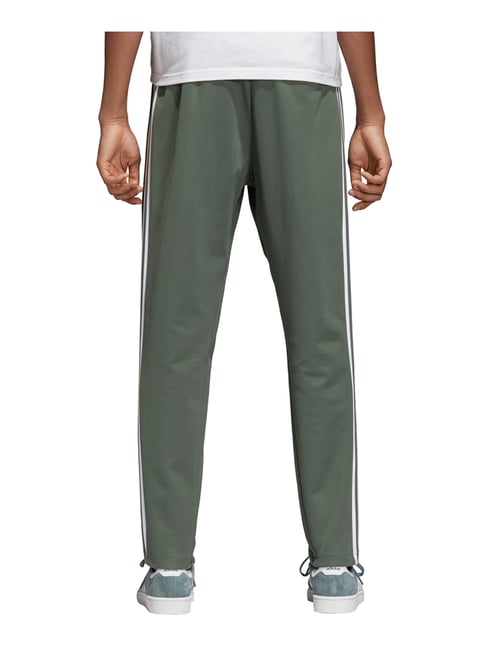 Olive green hotsell adidas track pants