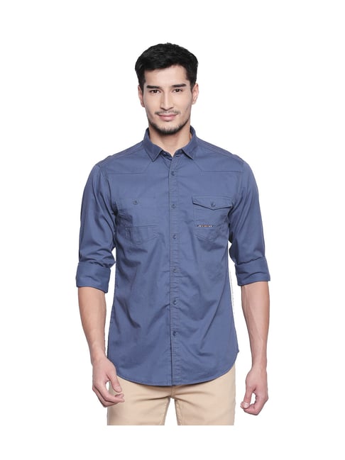 navy blue shirt and jeans