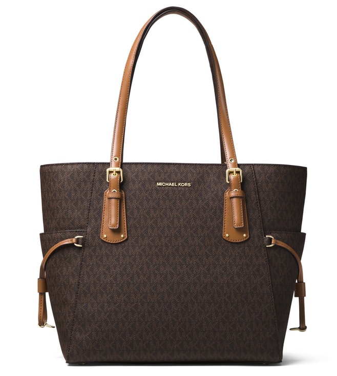 Small purse with golden logo element brand MICHAEL KORS —  Globalbrandsstore.com/en