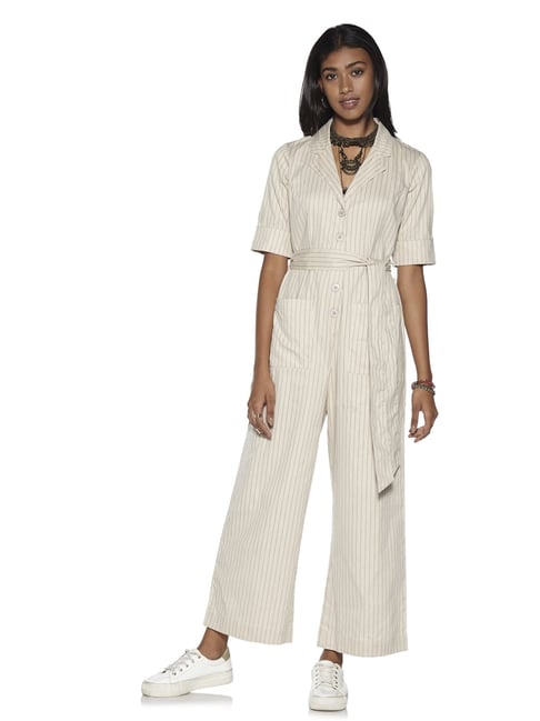 white jumpsuit with belt