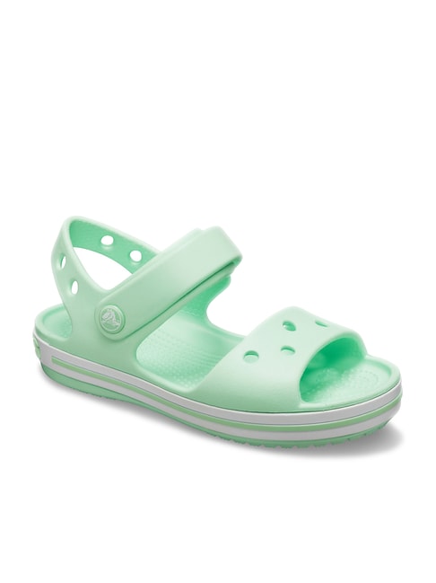 mint green croc slides