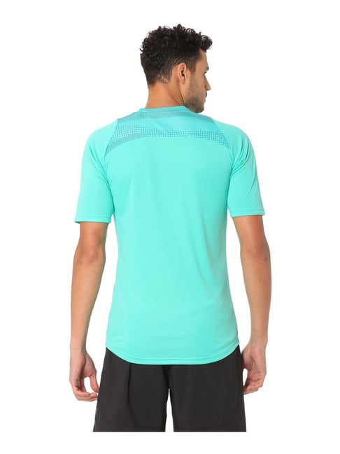 mint green puma shirt