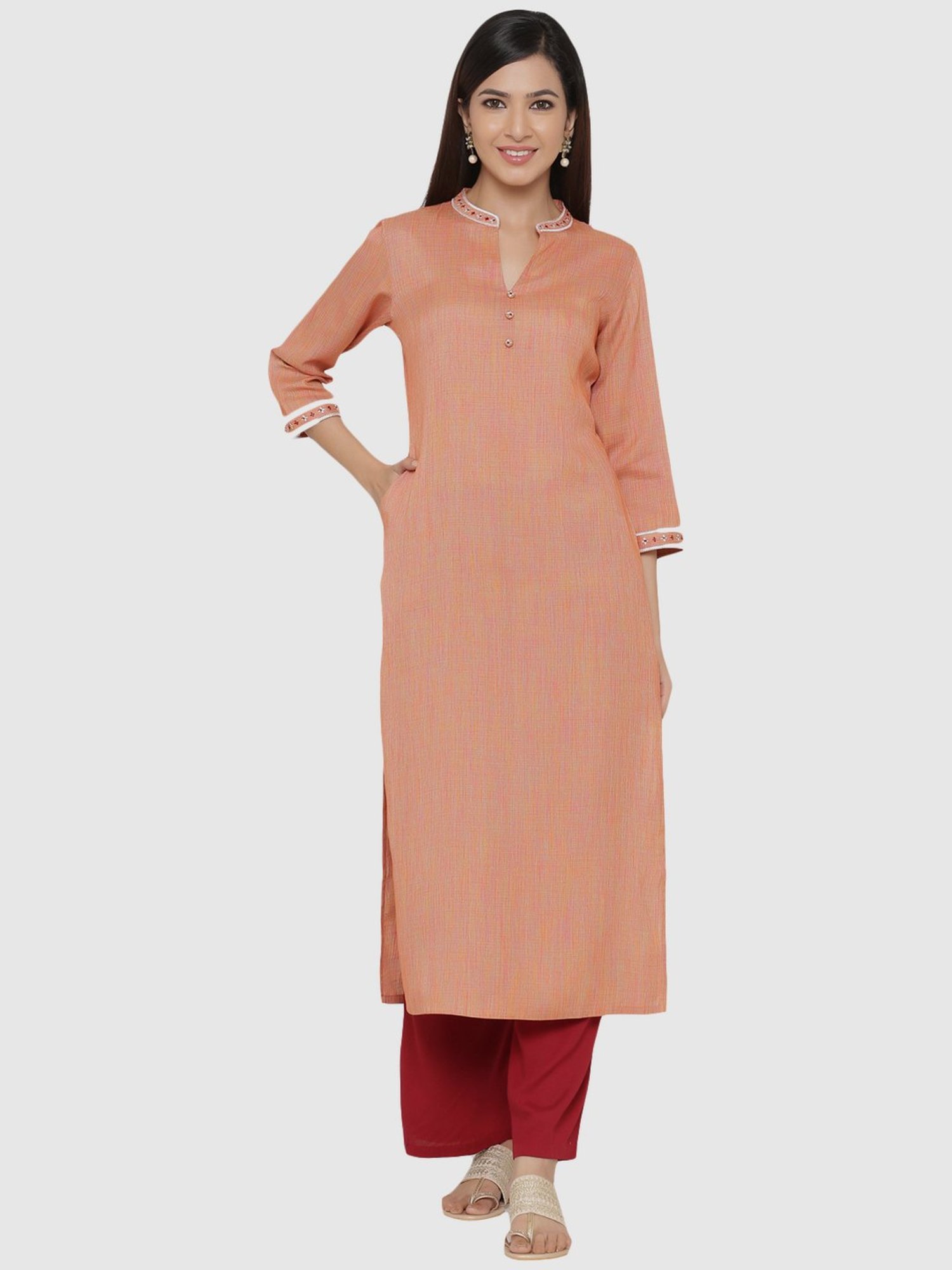 Stunning Peach Colored Casual Wear Embroidered Heavy Pure Cotton Kurti