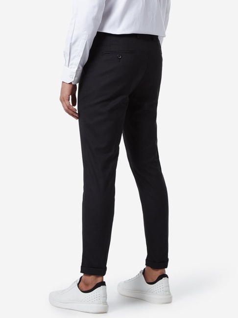 Buy WES Formals by Westside Black Carrot Fit Trousers for Men Online ...