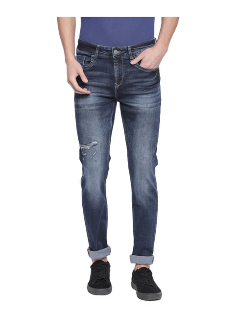 dark blue distressed jeans