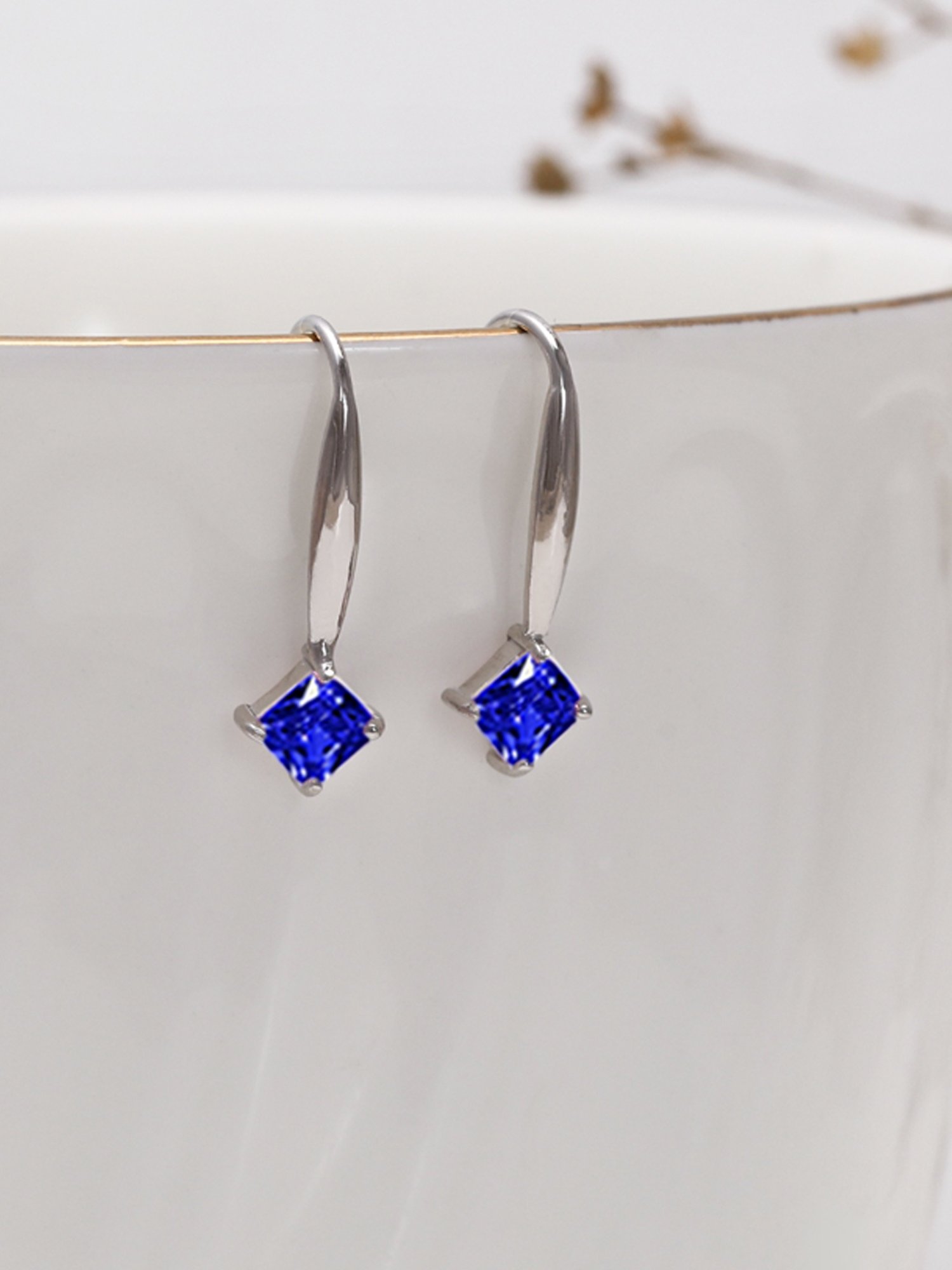 Buy SWAROVSKI Angelic Stud Pierced Earrings  Blue  Rhodium Plated   Shoppers Stop