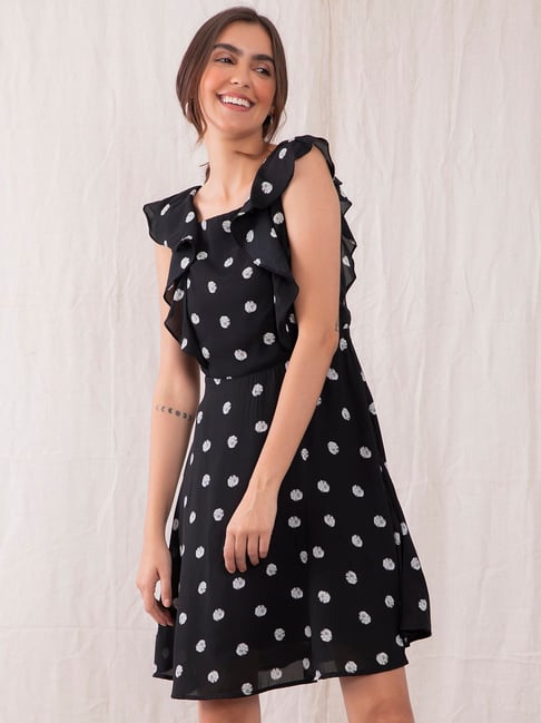 beige and black polka dot dress