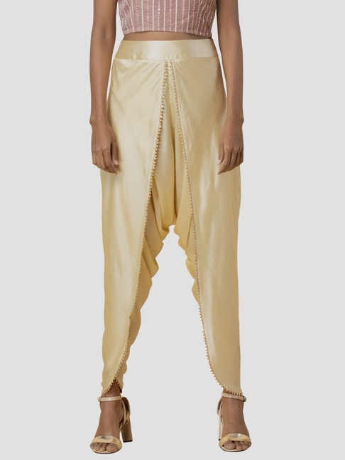 Buy RITU KUMAR Pleated Satin Dhoti Pants | Ecru Color Women | AJIO LUXE