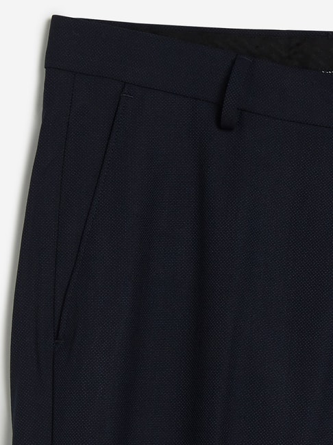 Buy WES Formals by Westside Navy Carrot Fit Trousers for Men Online ...