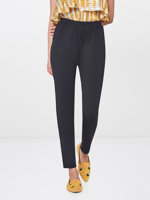 Buy Oumbre Women Black Solid Loose Fit Parallel Trousers  Trousers for  Women 7492847  Myntra