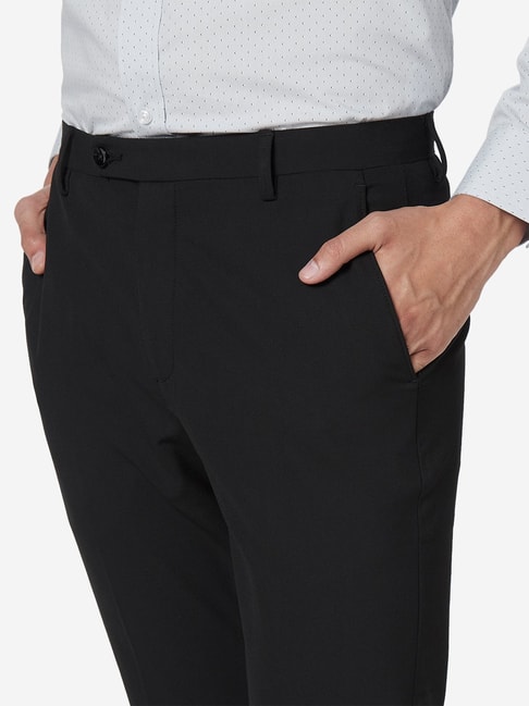 Buy WES Formals by Westside Black Carrot Fit Trousers Online at best ...