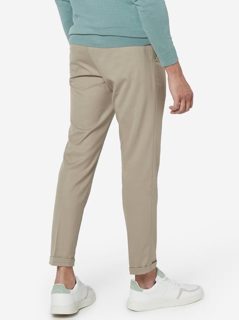 Buy WES Formals by Westside Light Khaki Carrot Fit Trousers Online at ...