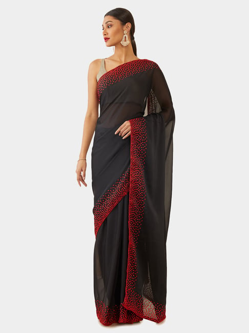 Black Sarees Online in India from Soch - Black Georgette Floral Zari Woven  Saree with Tasselled Border