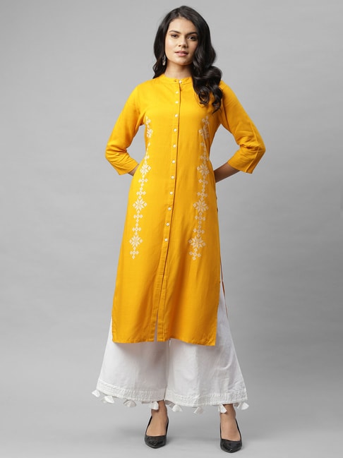 Yellow white Flared short cotton kurti with a matching Yellow cotton dhoti  pants . KALKI Fashion India