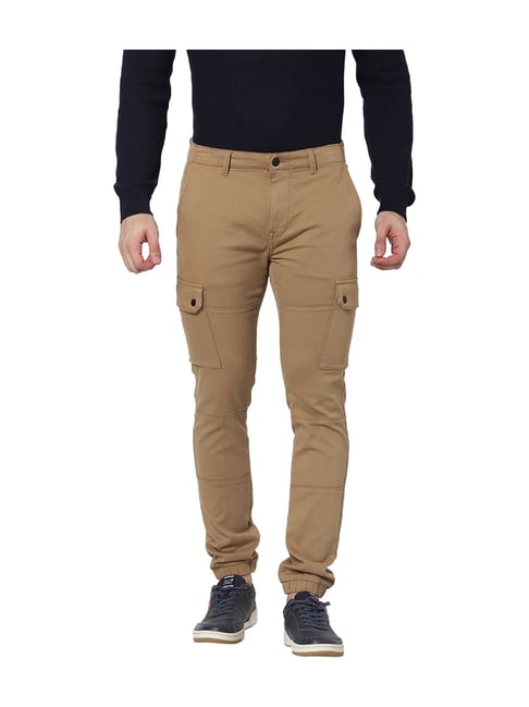Buy Celio Men Khaki Solid Skinny Fit Regular Trousers on Myntra |  PaisaWapas.com