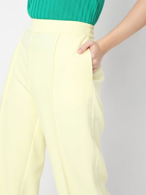 Light yellow embroidered pants by D'ART STUDIO | The Secret Label